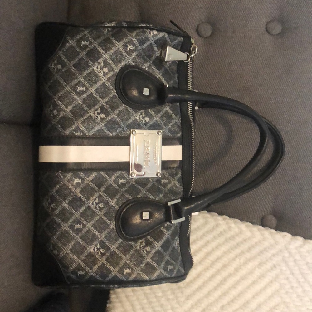 Gwen Stefani LAMB purse. $120 (originally $450)